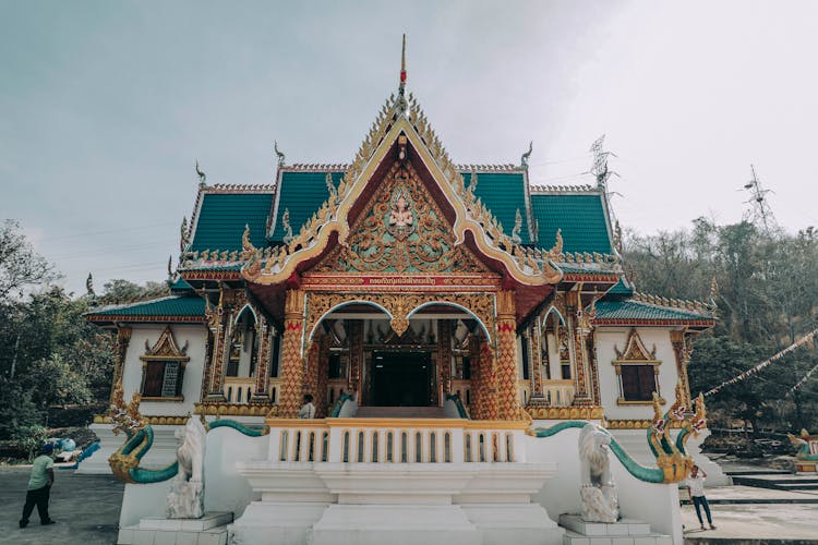 Facade Of Old Buddhist Temple In Laos