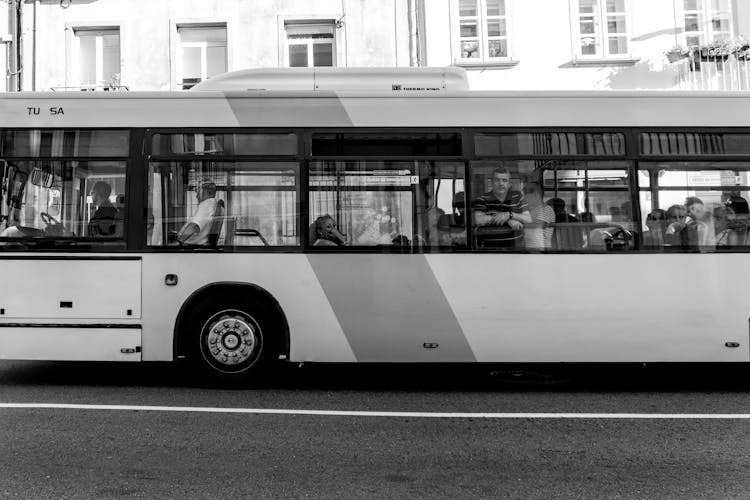 People Riding The BUs 