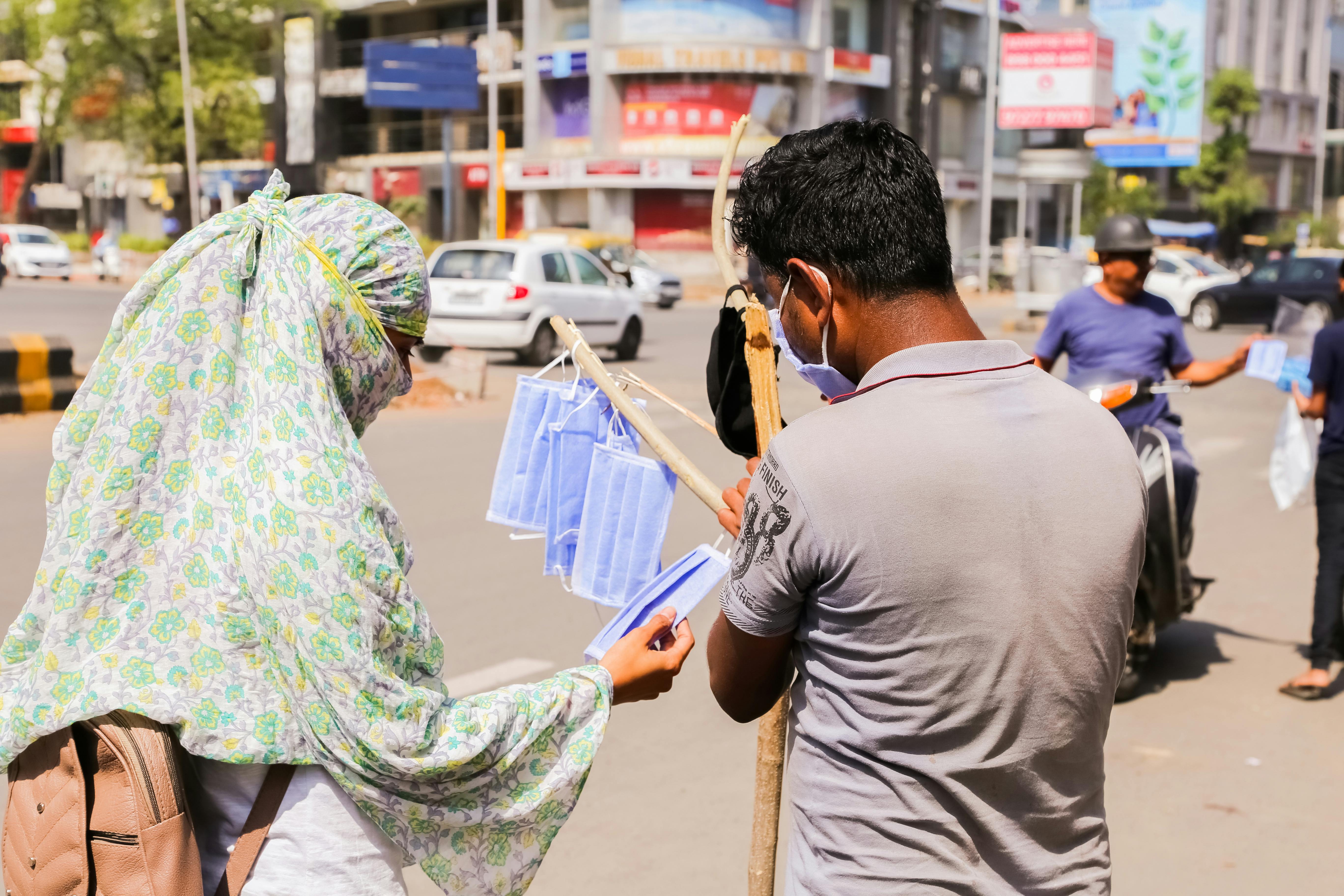 photo of person selling face masks