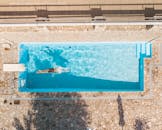 Top View Photo of Person Swimming