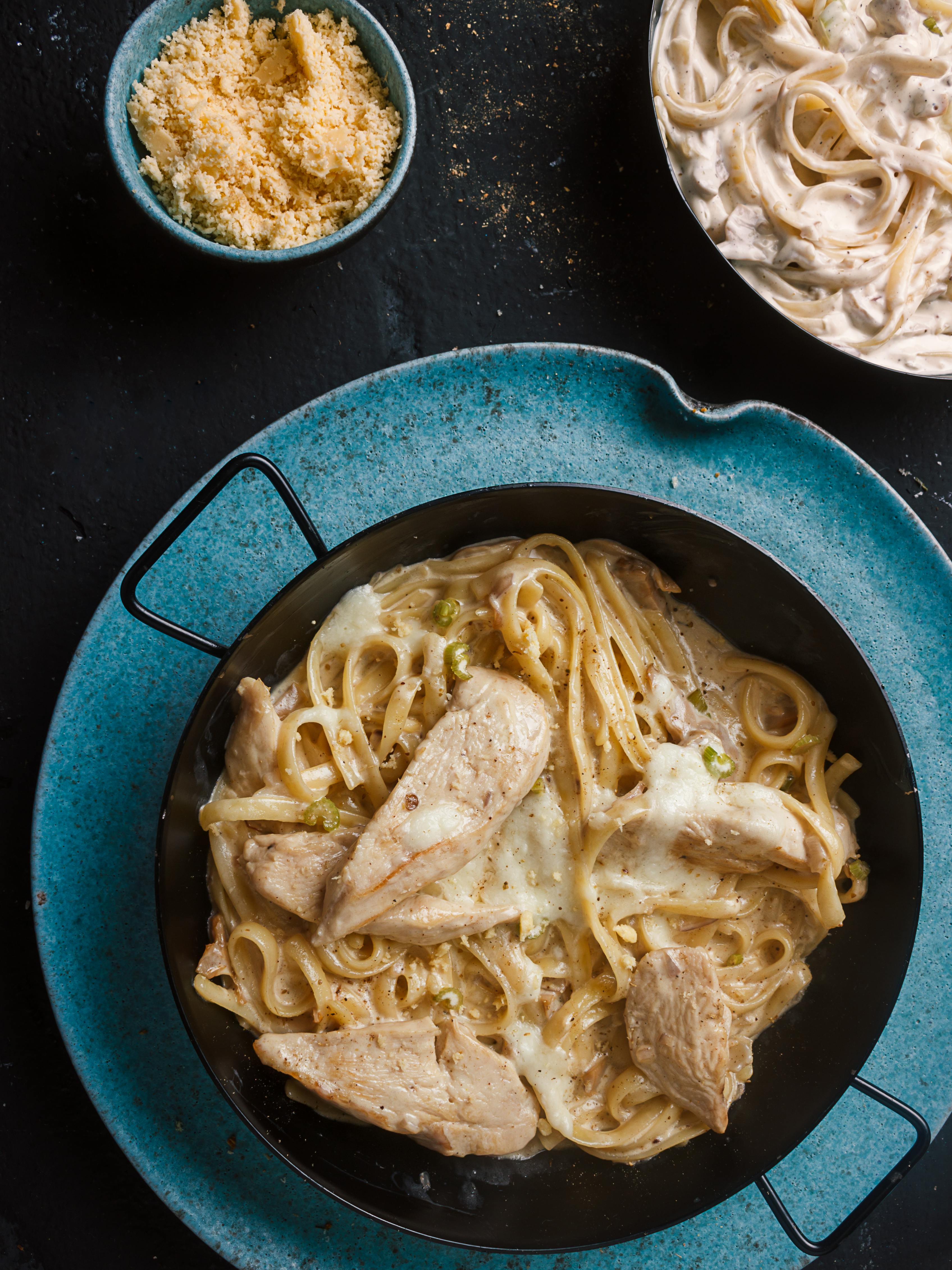 pasta dish on black ceramic bowl