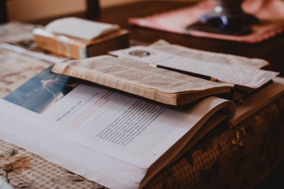 Photo of Open Books on Table