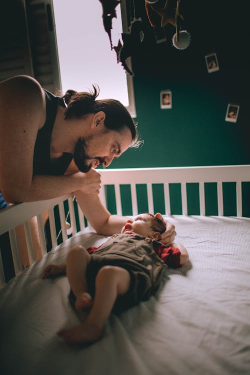 Free Father Looking at his Baby Stock Photo