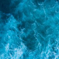 Aerial view of an ocean wave, by Curioso Photography on Pexels