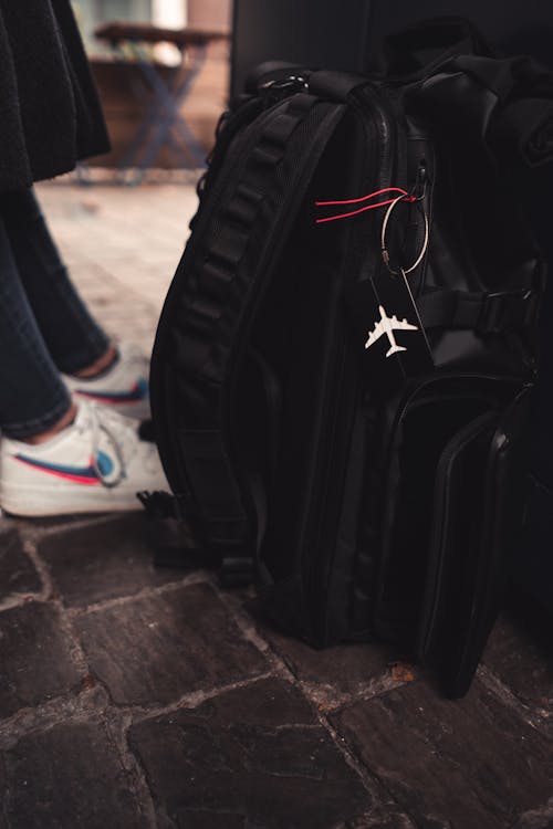 Free Close-up of a Black Backpack on the Ground Stock Photo