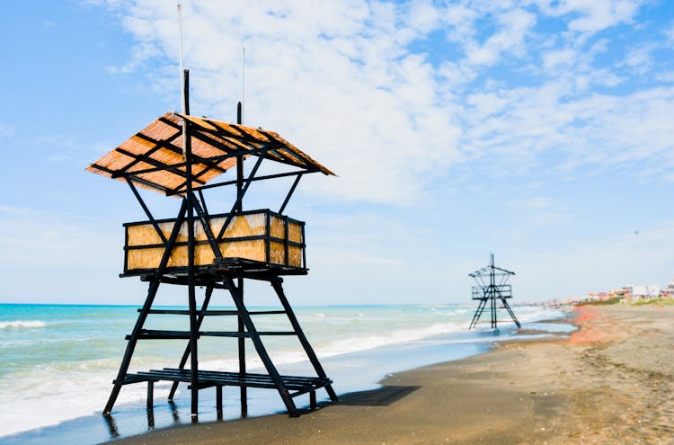 Wooden Lifeguard House On Sandy Beach