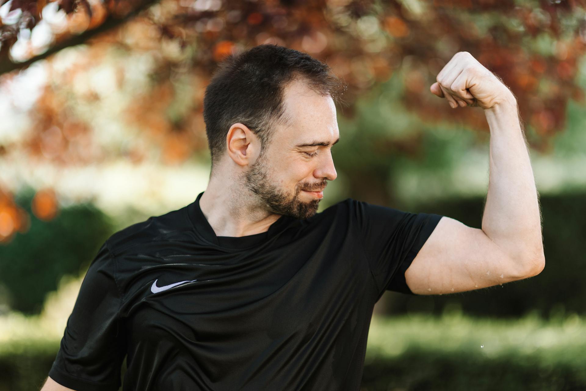 A Man Flexing His Arm