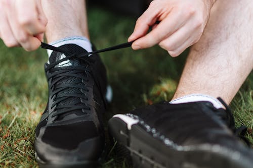 Ingyenes stockfotó beköt, cipőfűző, fekete cipők témában