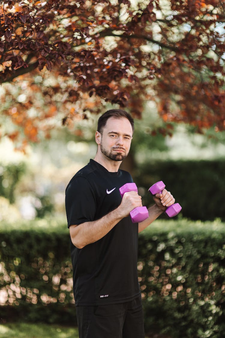 Man In Black Shirt Exercising 