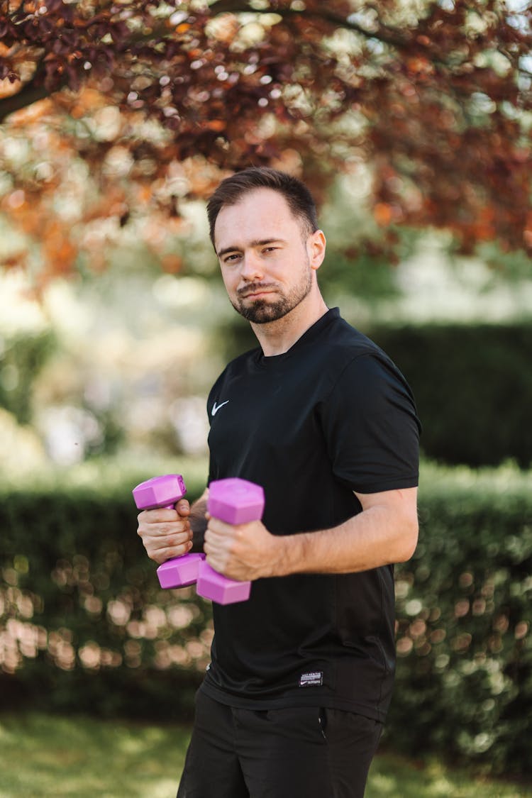 Man In Black Shirt Exercising 