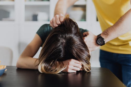 Free Person's Head Down on the Table Stock Photo