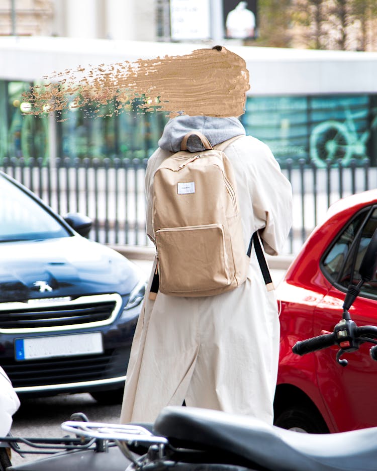 Man In Brown Jacket Standing Beside Red Car