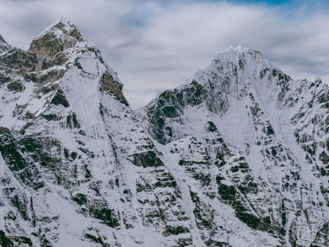 Stunning view of snow-capped mountains in Khumjung, Nepal, showcasing natural beauty.