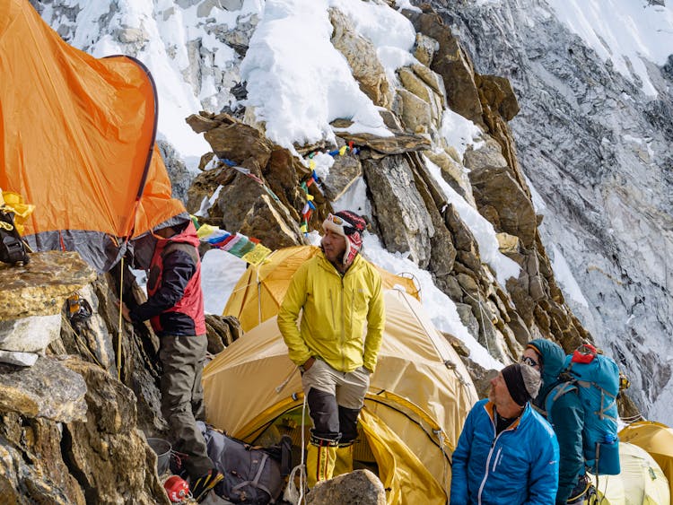 Mountain Climbers Establishing Camp