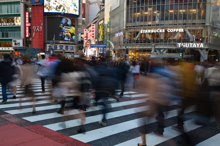 People Crossing The Street In Japan