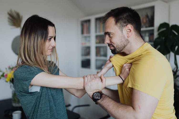 A Couple In A Physical Confrontation