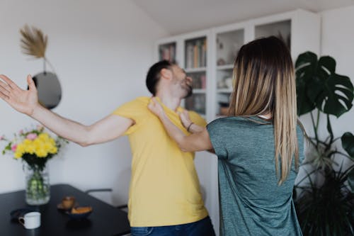 Free A Wife Physically Abusing Her Husband Stock Photo