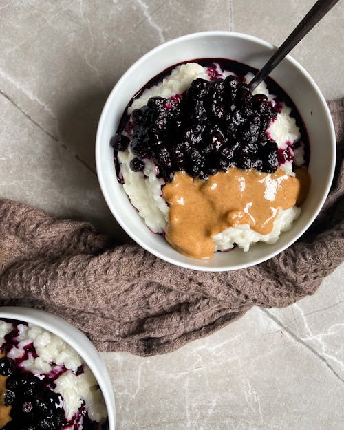 Bowl of Healthy Porridge with Berries on Top 