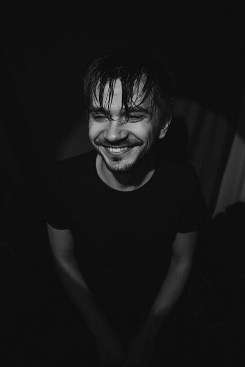Free Young smiling man with wet hair Stock Photo