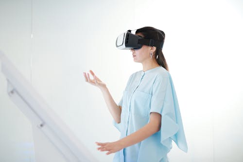 Young Woman Using Virtual Reality Headset