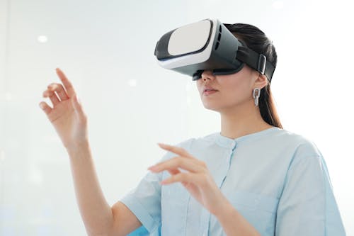 A Woman using Virtual Reality Goggles 