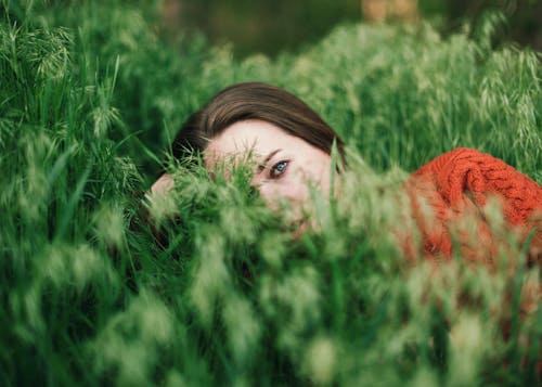 Beautiful woman resting in grass