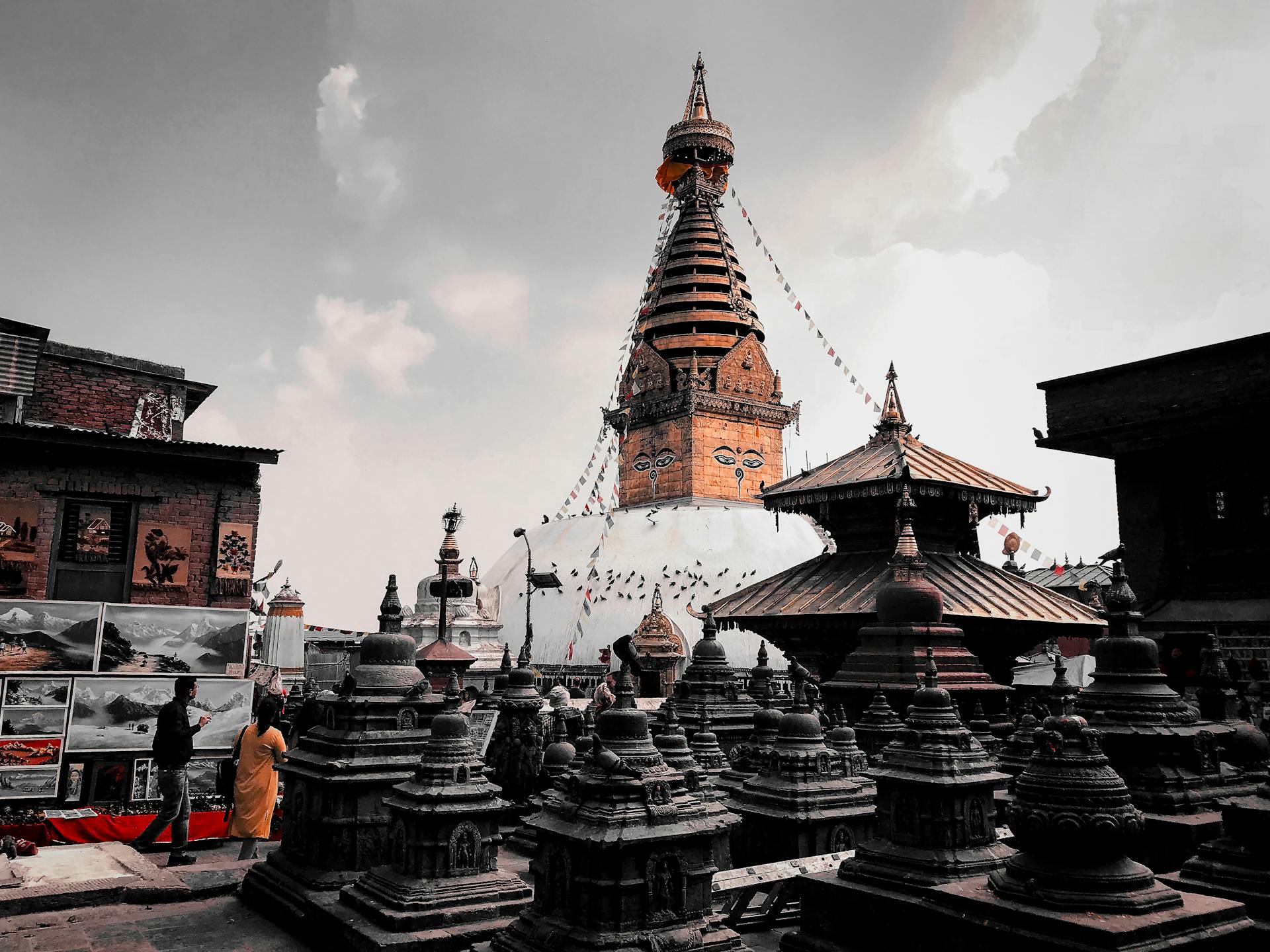 Iconic Swayambhunath Stupa in Kathmandu, showcasing its traditional architecture and serene surroundings.