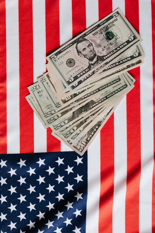 American dollars placed on national flag