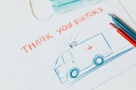 Drawing of an Ambulance with the text Thank you Doctors