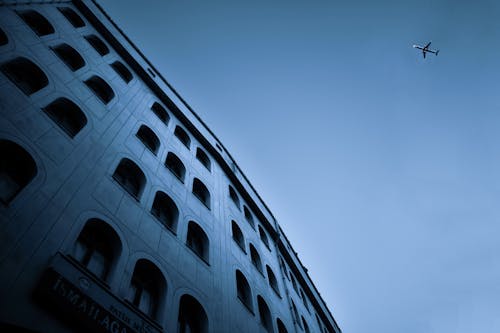 Low Angle Photo of Concrete Building Under Blue Sky