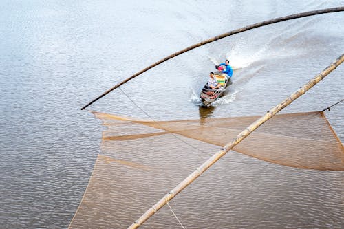 Immagine gratuita di acqua, barca da pesca, donne