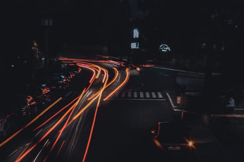Time Lapse Photography of Cars on Road during Night Time
