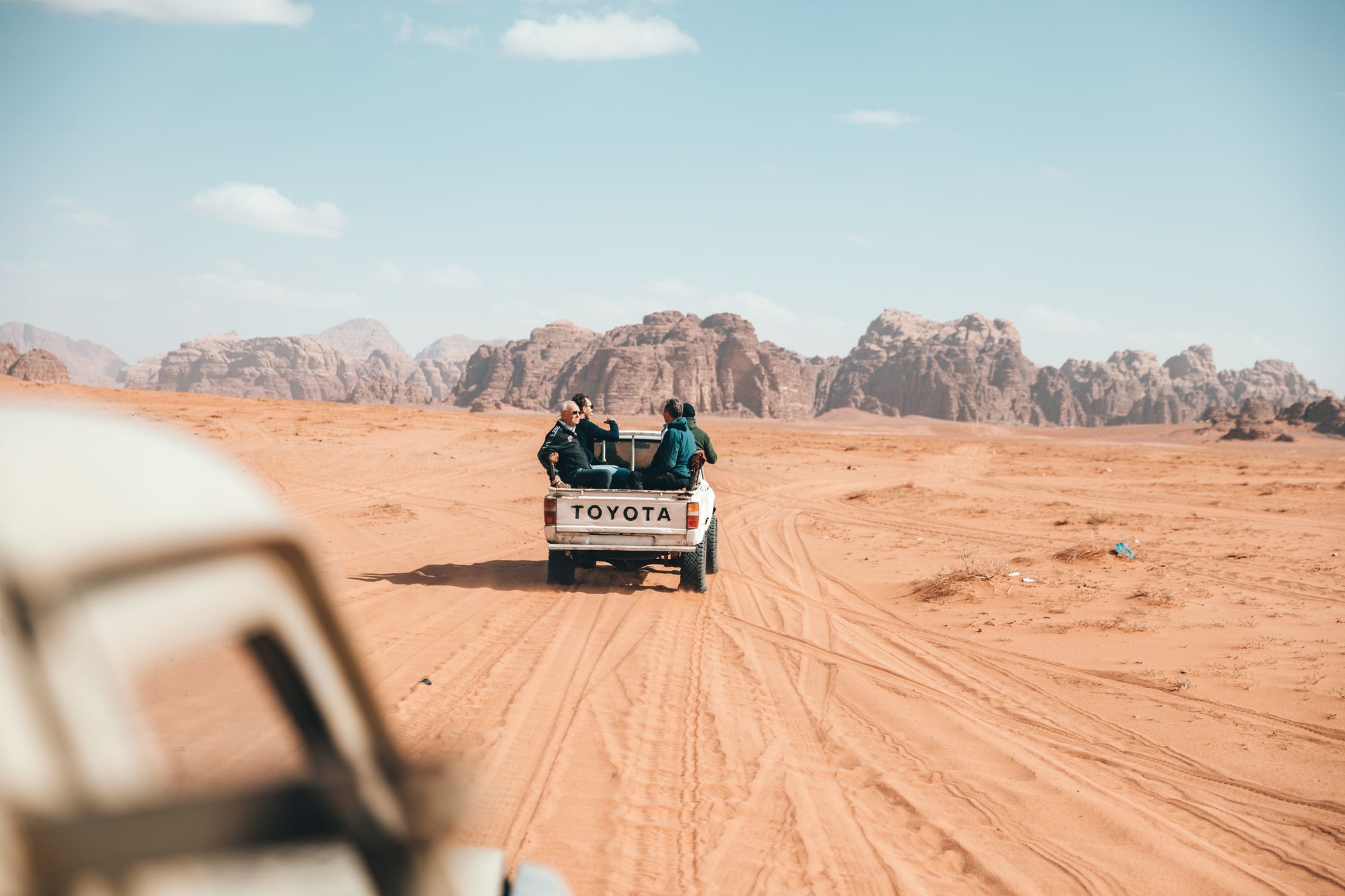 Photo of People Riding on Pickup Truck · Free Stock Photo