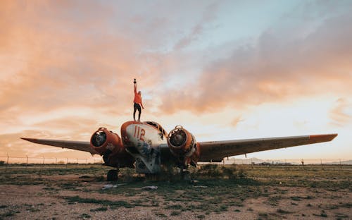 Free Male on old plain at sundown Stock Photo