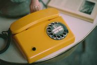 Yellow and Silver Rotary Phone
