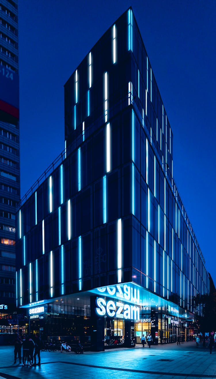 Blue And White Concrete Building At Night