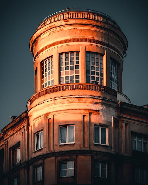 Brown Concrete Building Under Blue Sky