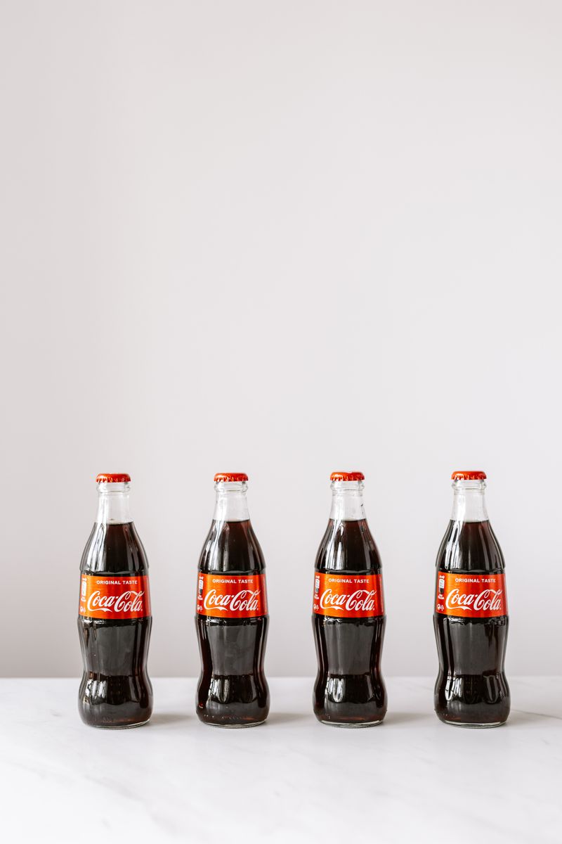 How does Diet Cola compare to regular cola in terms of taste and ingredients?