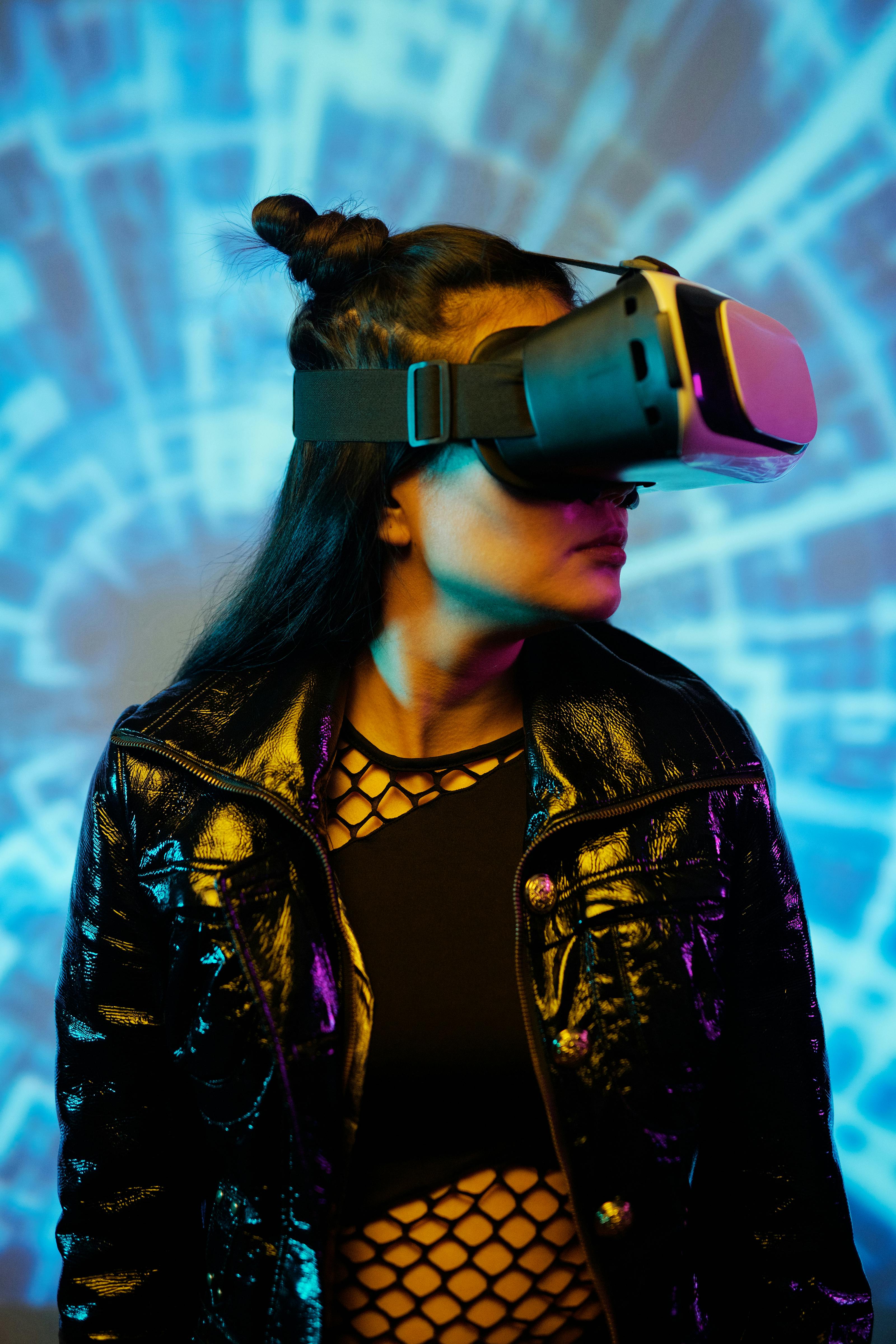 woman in black leather jacket wearing vr goggles