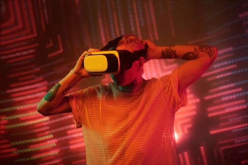 Man in White Shirt Wearing Black and White Vr Goggles