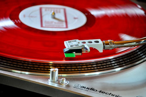 Free Close-up Photo of Red Vinyl Record Stock Photo