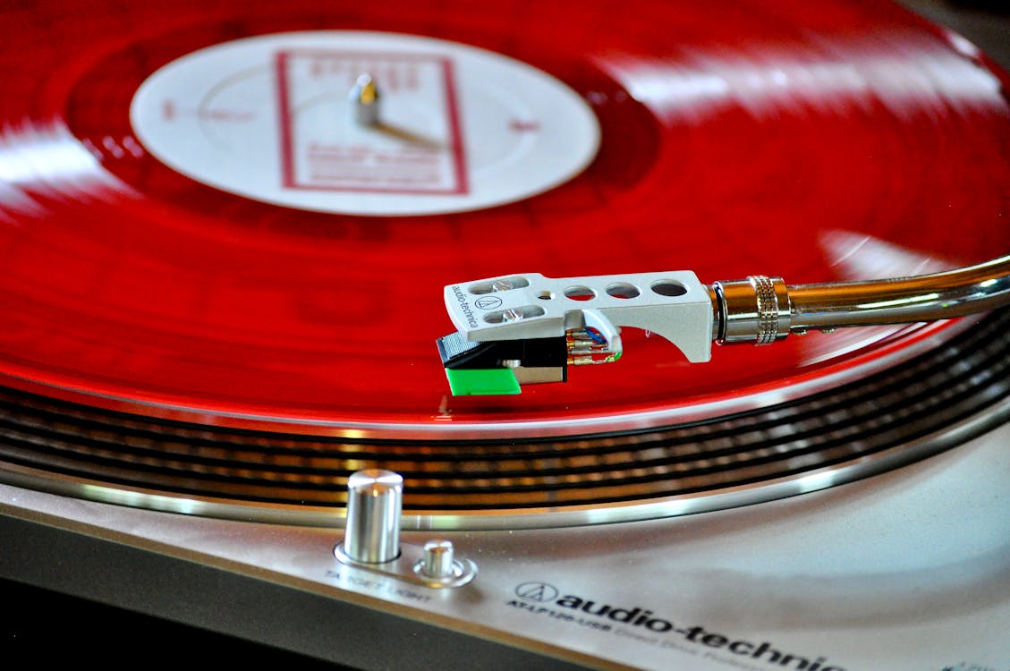 Close-up Photo of Red Vinyl Record