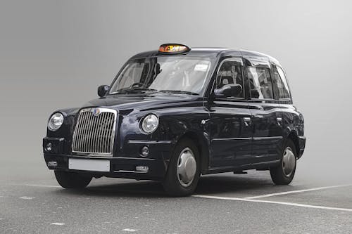 Kostenloses Stock Foto zu blaues taxi, england taxi, englisches taxi