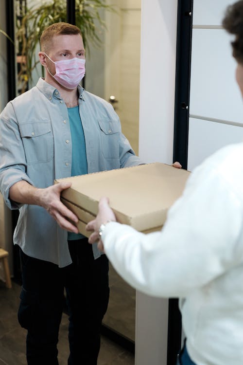 Person packaging an item for shipping