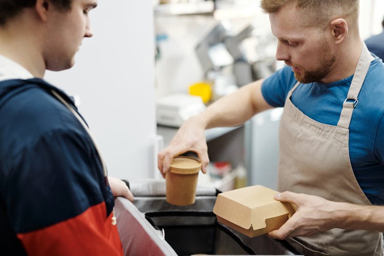 A Man Serving Takeaway