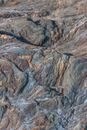 Rocky terrain in mountain valley in sunlight