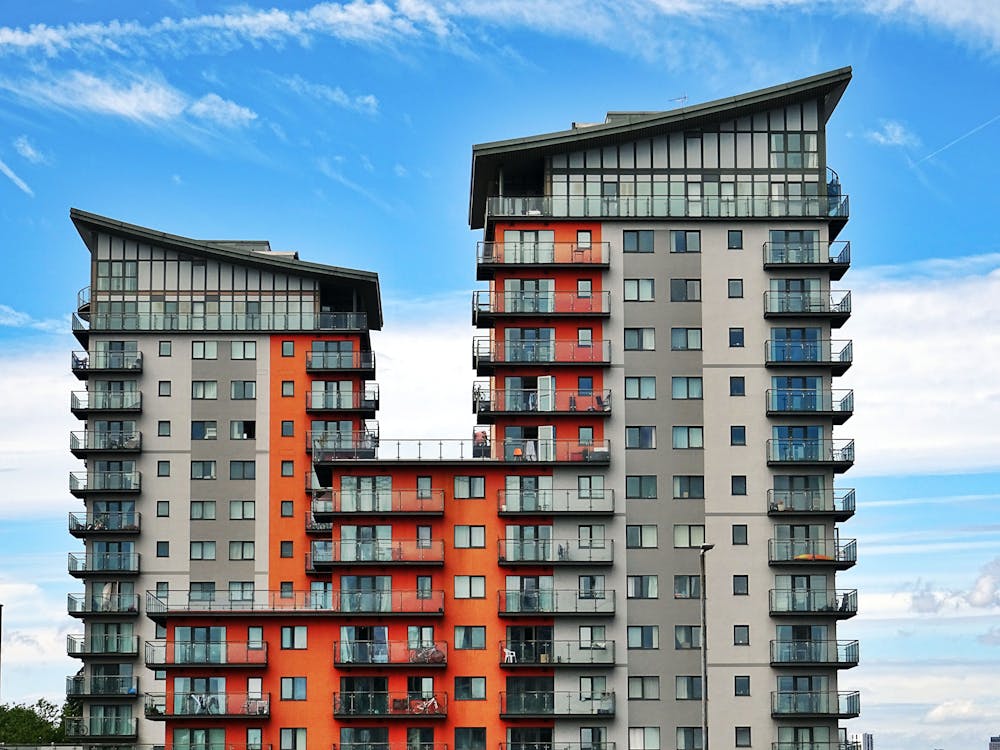 Free Gray, Red, And Orange Concrete Building Stock Photo