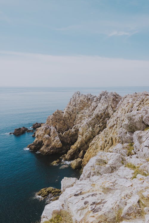 Rocky coast of vibrant ocean