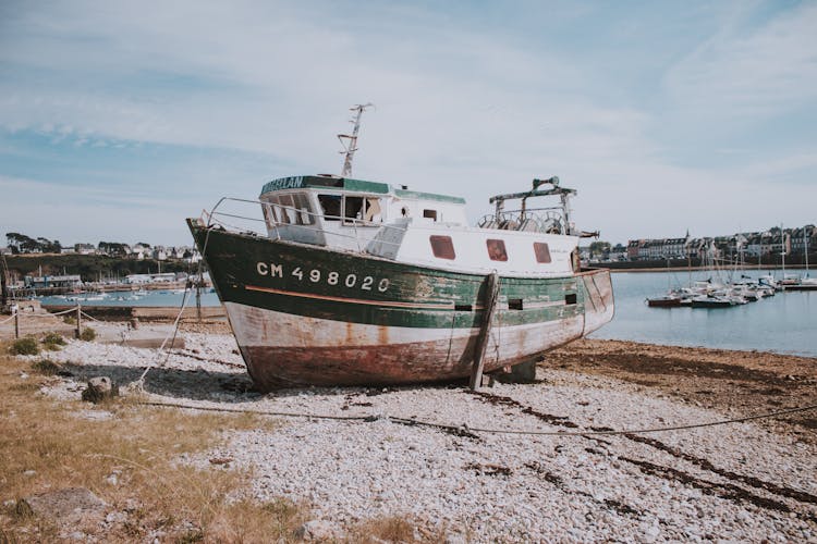 Fishing Ship On Beach In Port