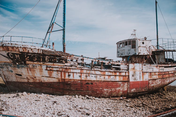 Old Fishing Ship On Shore